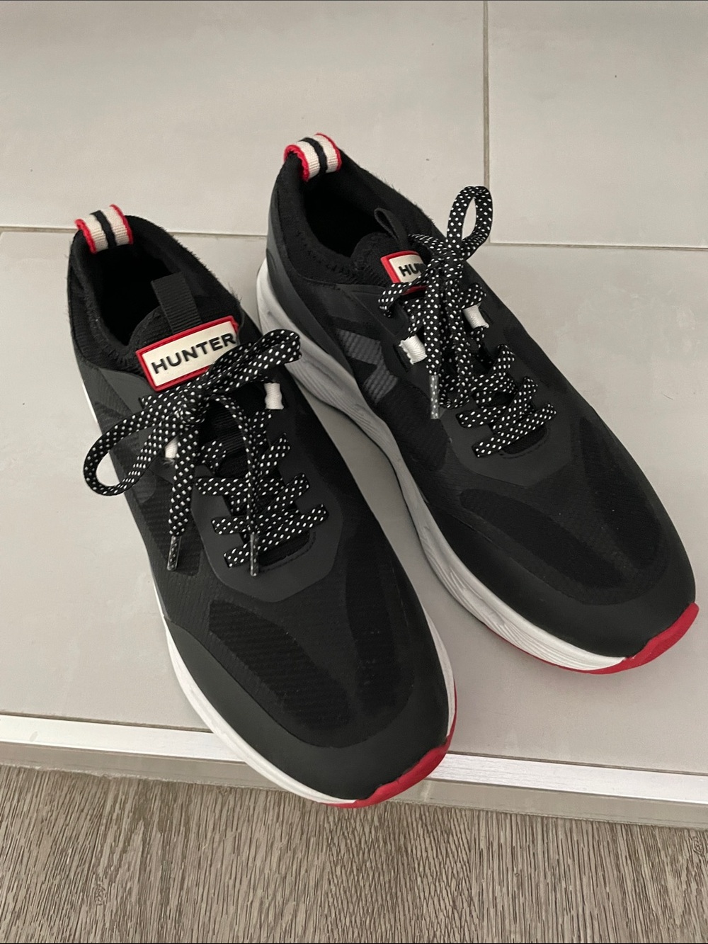 Hunter Black Athletic Sneakers with Red and White Accents Never worn